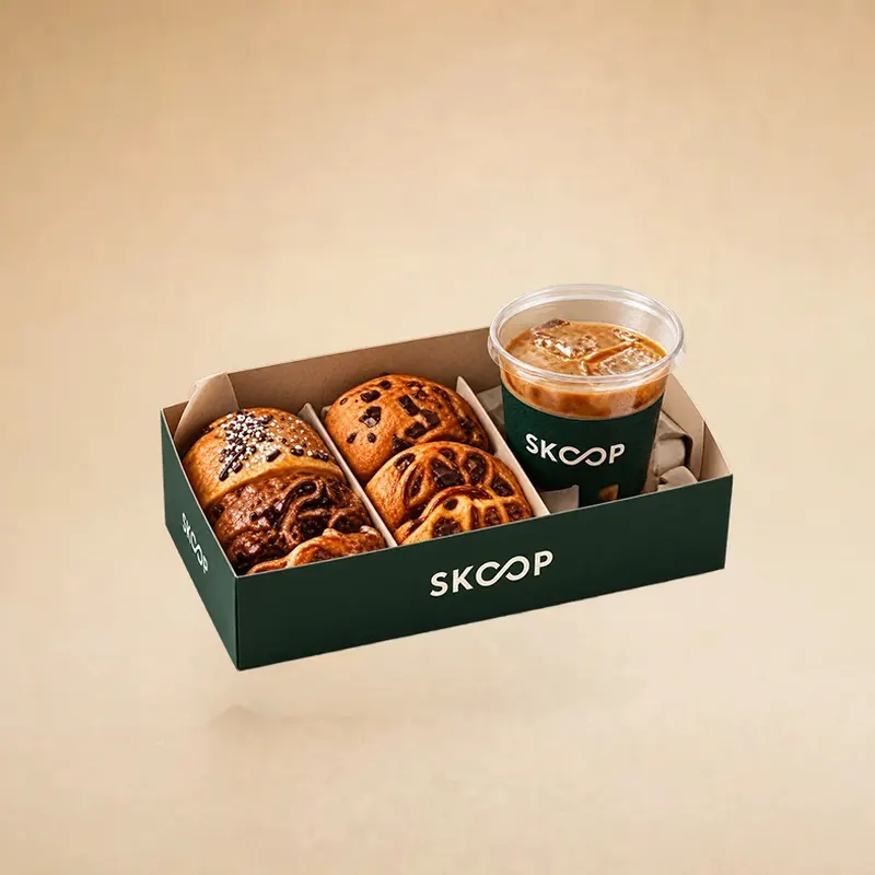 SKOOP box with pastries and an iced coffee