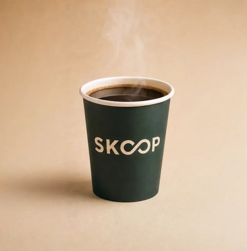 SKOOP iced coffee cup, milk and coffee swirling together