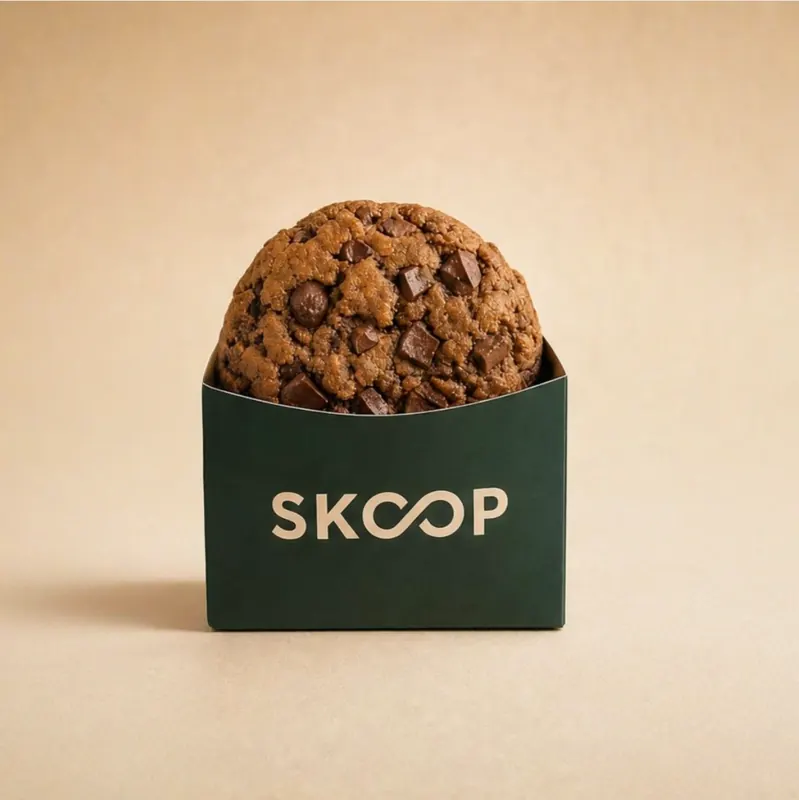 Chocolate chip cookie in its SKOOP sleeve
